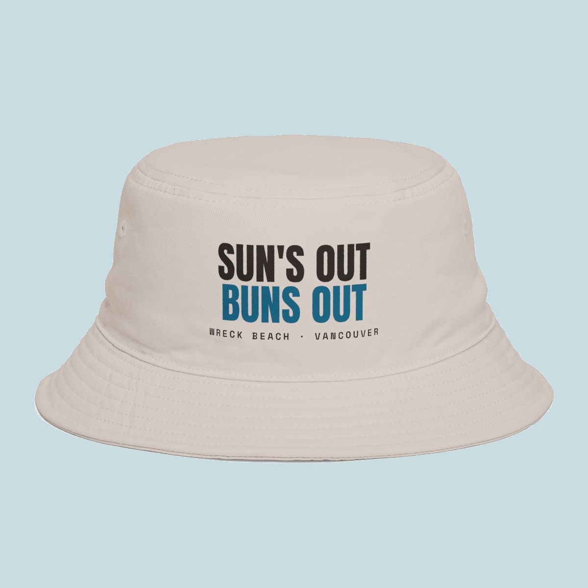 Sun's Out Buns Out bucket hat in bone cotton with ink and ocean-blue Wreck Beach lettering
